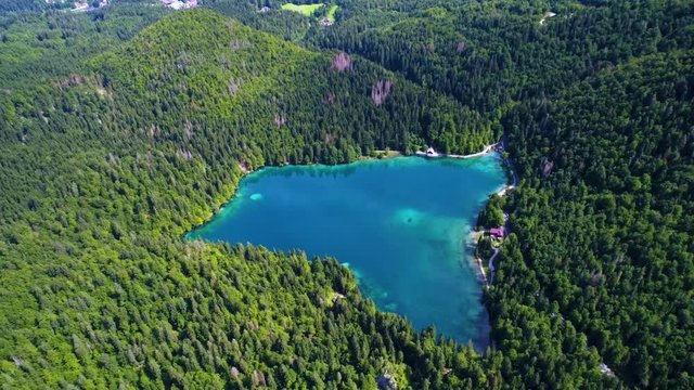 Lake Lago di Fusine Superiore Italy Alps. Aerial FPV drone flights.