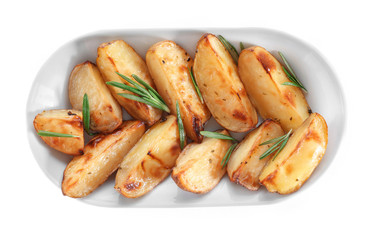 Delicious baked potatoes with rosemary on plate, isolated on white