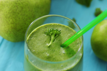 Healthy smoothie with kale in glass, closeup