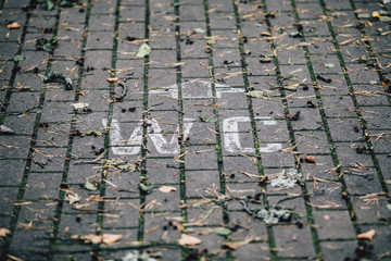 WC toilet sign on the ground