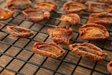 Dried apricots on metal grid