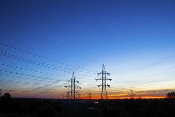 Beautiful red sunset and high-voltage lines