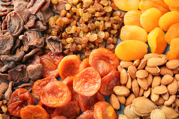 Dried apricots, raisins and nuts as background