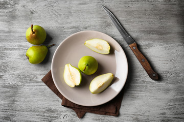 Ripe pears on plate