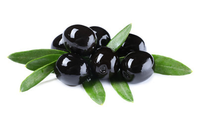 Black olives with leaves, isolated on white