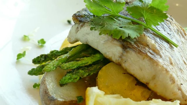 Sea bass steak with sauce
