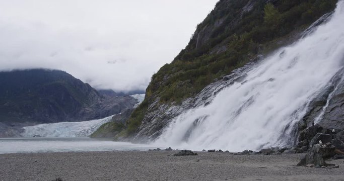 Alaska nature landscape with Mendenhall Glacier and Nugget Falls waterfall. RED EPIC SLOW MOTION.