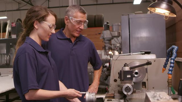 Engineer Training Female Apprentice On Lathe Shot On R3D