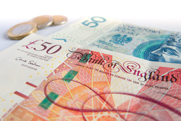 British pound and Polish zloty angle view background