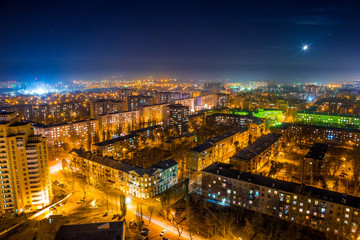 Fototapeta na wymiar Night Voronezh aerial skyline. Moon above Voronezh