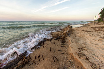 Historic Shipwreck On Great  Lakes Coast. Shipwreck of the ill fated wooden iron ore ship the Joseph S. Fay at Forty Mile Point on the coast of Lake Huron near Rogers City, Michigan. - obrazy, fototapety, plakaty
