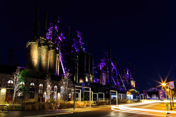 Steel stacks with purple and yellow lighting as entertainment area in downtown Bethlehem Pa.