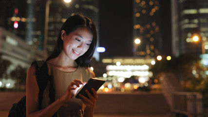 Woman looking at mobile phone