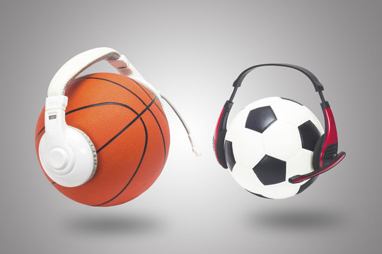 Basketball with football and headphones on a white backdrop.