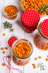 Berries of sea buckthorn with syrup