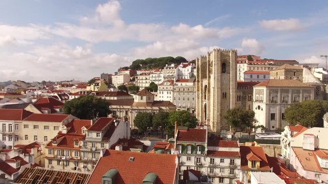 Aerial view of historical part of Lisbon and Lisbon Cathedral at sunny day Portugal