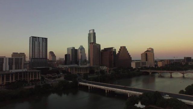 Ascending aerial, Austin cityscape at sunset