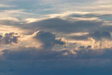 golden glow on storm clouds