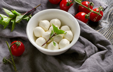 Bowl of small mozzarella balls