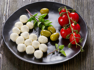 Bowl of small mozzarella balls