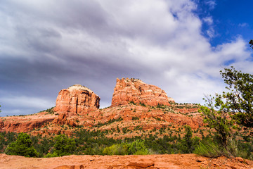 Red rocks with intense clouds