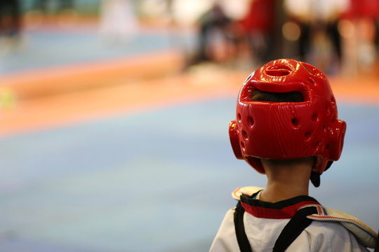 Young Taekwondo athletes are fighting during contest