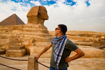 Looking at sphinx in Giza. Cairo, Egypt
