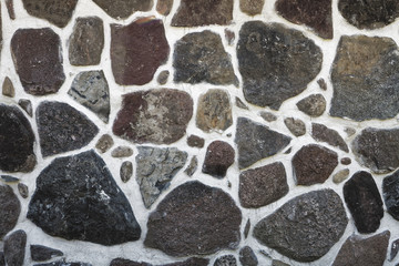Dark abstract background texture of a stone wall