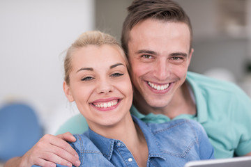 Fototapeta premium couple relaxing at home with tablet computers