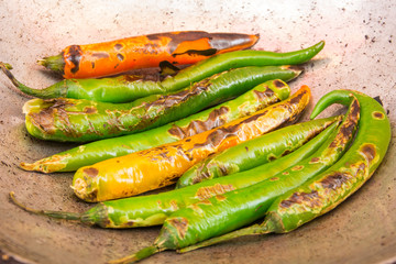 Fresh chili peppers roasting