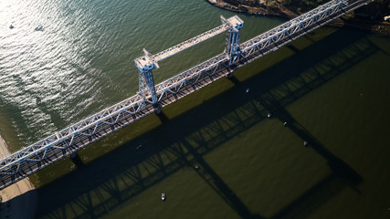 aerial view of railroad drawbridge through liman and sea