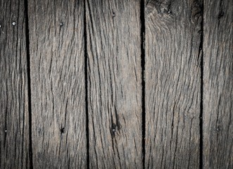 Old  grey wooden texture for background or mockup. Wooden background with darkened edges close up. Barn wall texture. Rustic fence or grey flat wood banner billboard or  signboard.