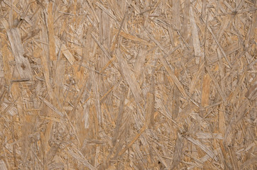 close-up of a brown pressed wood texture background