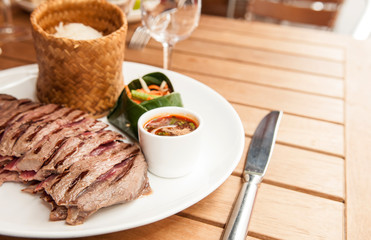 Thai style grilled beef with sticky rice