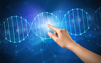 Hand touching DNA molecule