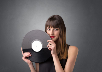 Lady holding vinyl record