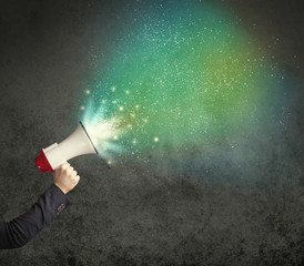 Hand holding megaphone