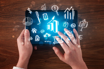Business hands working on tablet © ra2 studio