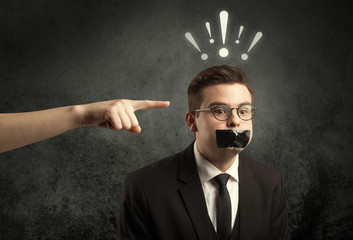 Hand pointing at business employee