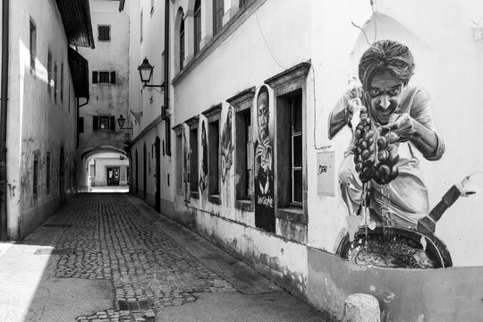 Kranj old city european side alley street art graffiti black and white passage old building architect  