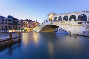 Rialto bridge at night in Venice, Italy