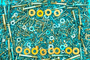 Abstract grunge metallic background from bolts, screws, nuts