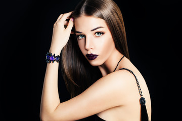 Fototapeta premium Glamorous Woman Fashion Model with Makeupand Long Hair on Black Banner Background