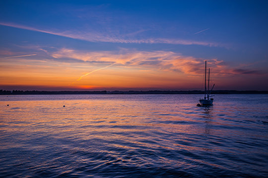 Beautiful sunrise over the beach in Rewa Poland