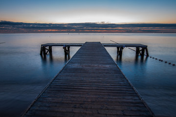 Obraz premium Anazing sunrise over the sea. Pier in Sopot.