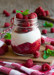 Creamy dessert with fresh raspberries