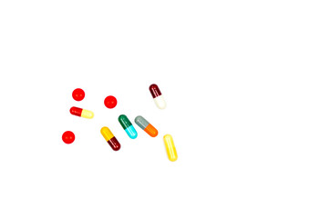 Colorful of antibiotic capsules pills isolated on white background with clipping path. Drug resistance, antibiotic drug use with reasonable, health policy and health insurance concept.
