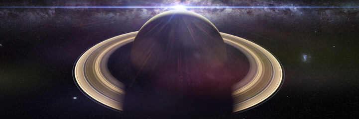 the planet Saturn with the Sun and the Milky Way galaxy © dottedyeti