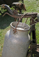 Antique milk can aluminum on the bicycle © ChiccoDodiFC