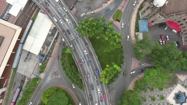 Busy Highway Road Junction in Malaysia. Aerial Fly Away View. 4K